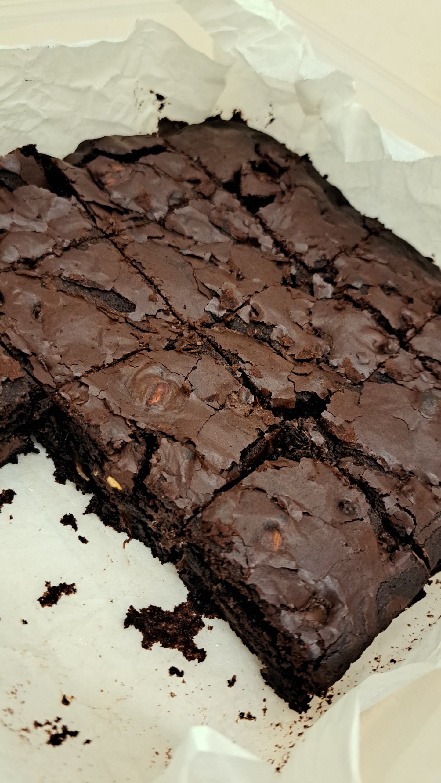 Dark bittersweet brownies. With perfect crispy skin and a soft chewy interior