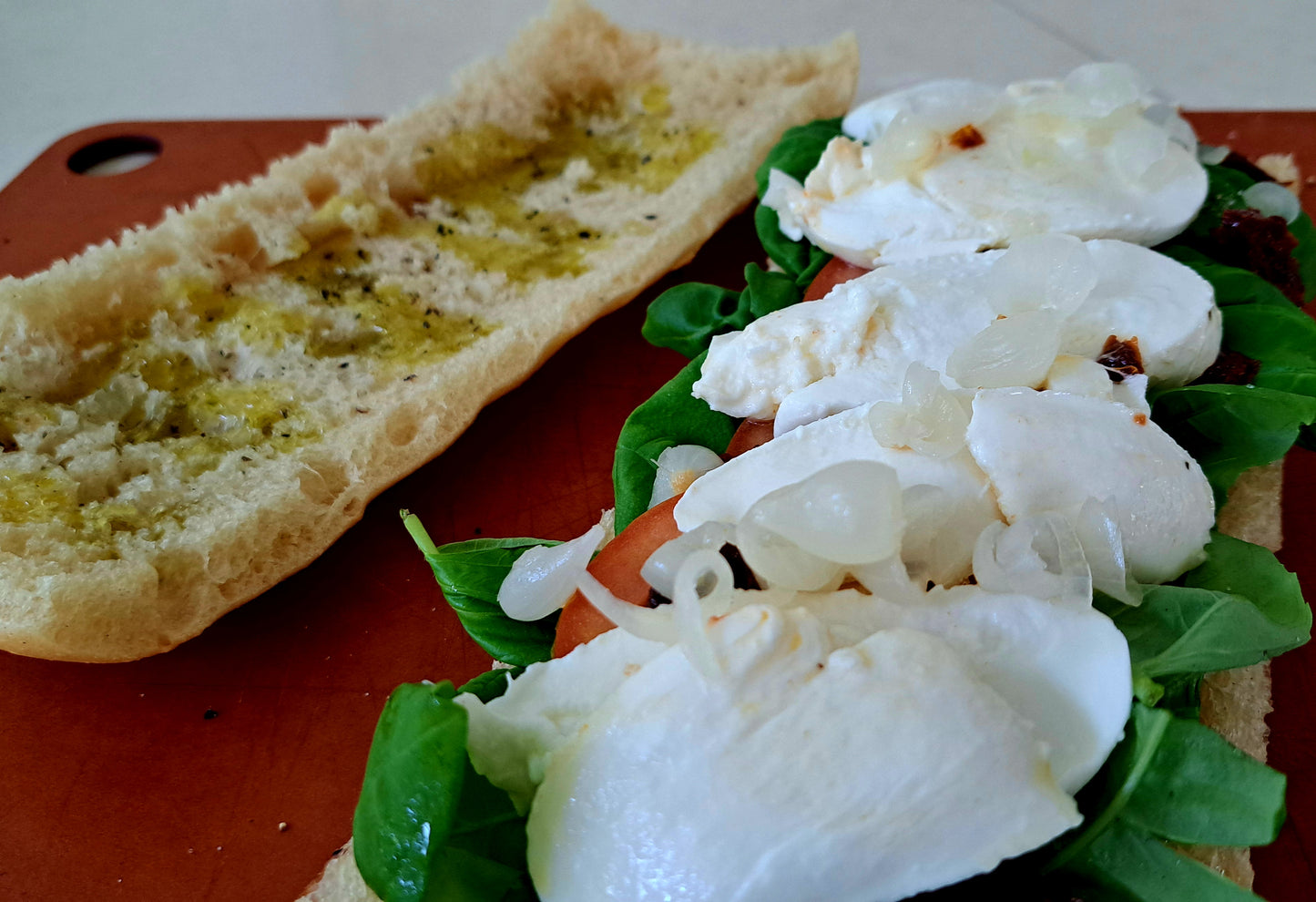 Caprese Schiacciata - Bufala Mozzarella, Tomatoes, Sundried tomatoes, Basil leaves, Pickled onions