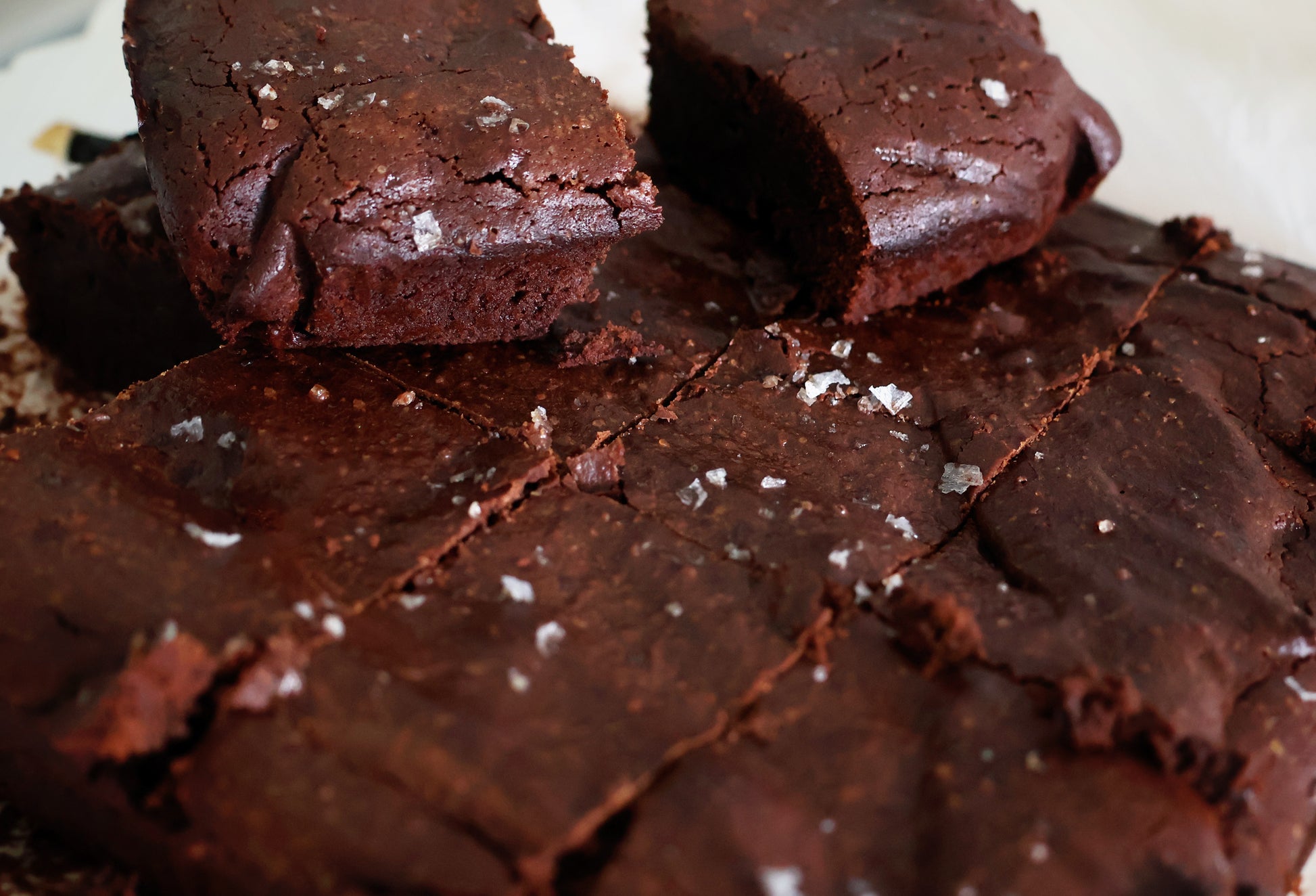 Fudgy chocolate brownies, toped with sea salt and a cripsy and craked exterior.