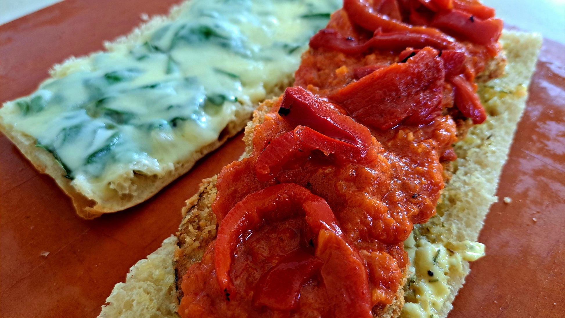 Eggplant Parmigiana - Deep fried eggplant, Pomodoro, Roasted peppers, Basil leaves, Mozzarella cheese, Garlic butter